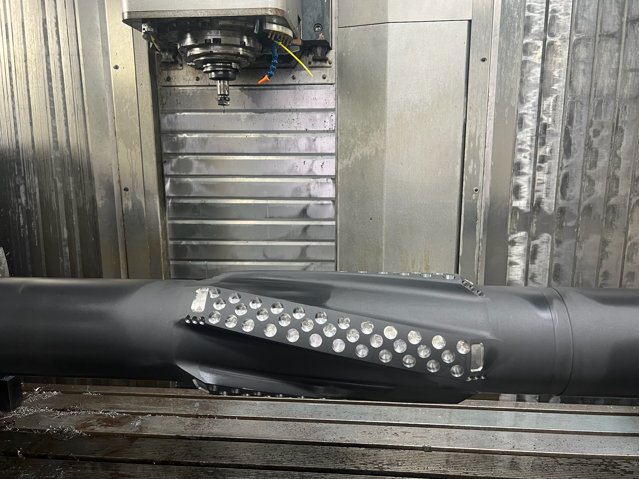 A CNC machine milling a metal part