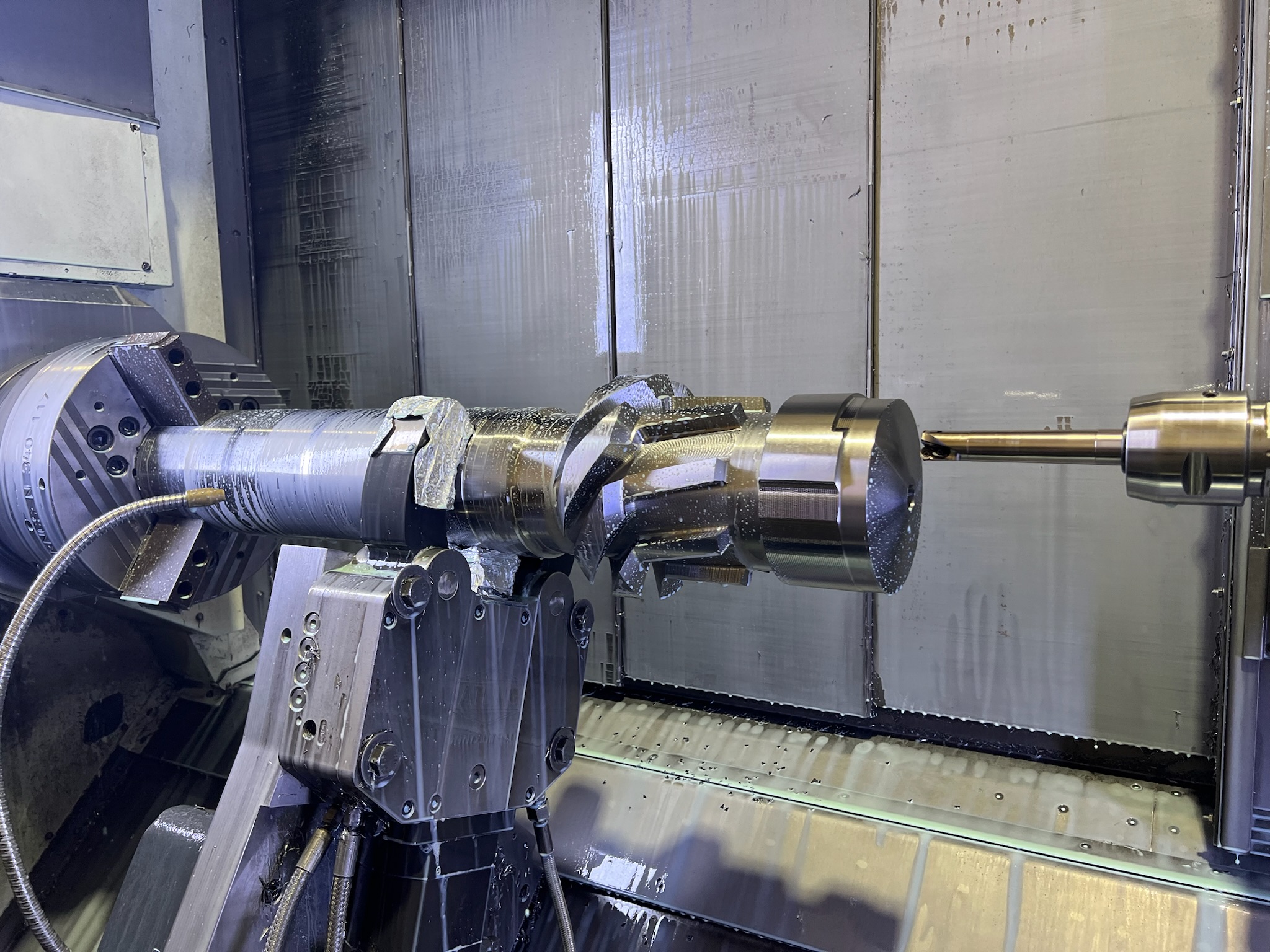 A 5 Axis CNC Machine in operation