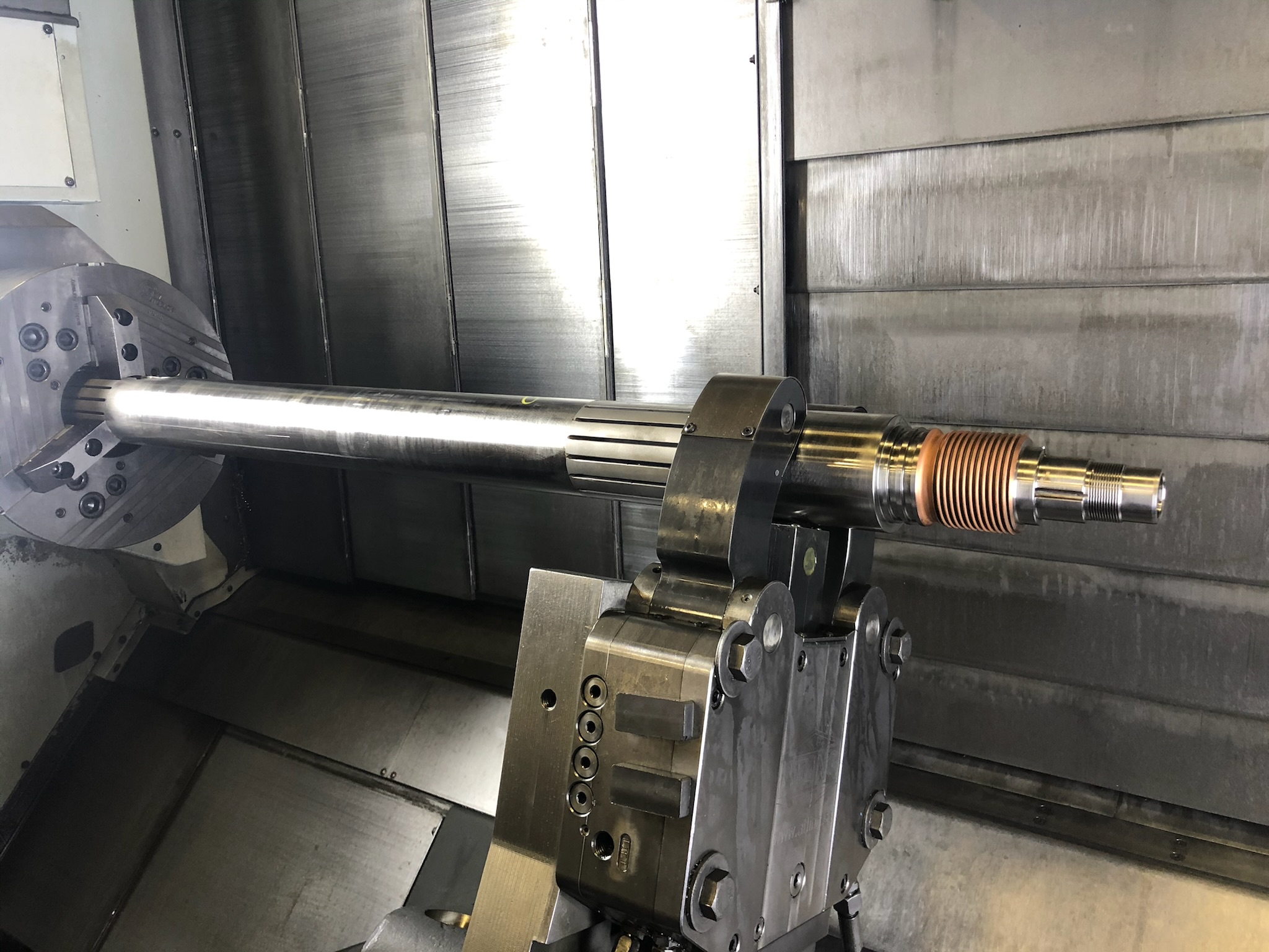 Metal being pressed in a machine